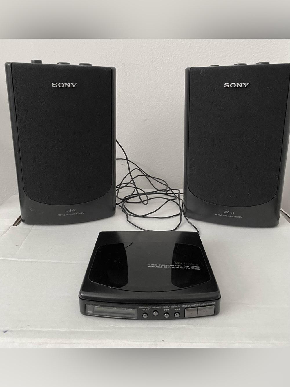 Technics and Sony Black Portable CD Player with Matching Black Speakers.